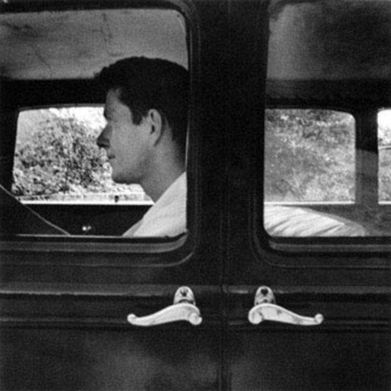 John Cage in his Model A Ford, 1952