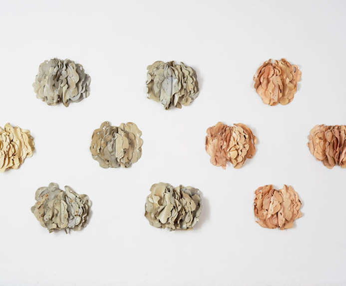 Hannah Wilke, Ponder-rosa Series 3: Double Sun (triangle) Blue Champagne (square), Broken Blossoms (circle), 1975. Latex with liquitex, metal snaps, and push pins, 15 sculptures. Copyright with the Estate of the artist